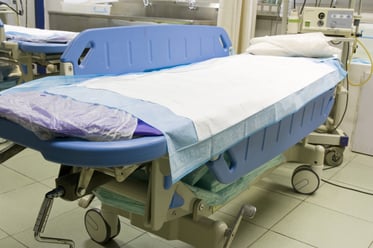 Photo of medical bed in modern hospital 